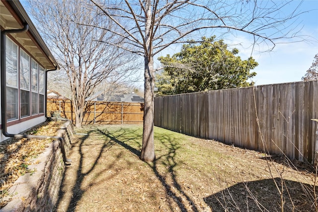 view of yard featuring a fenced backyard