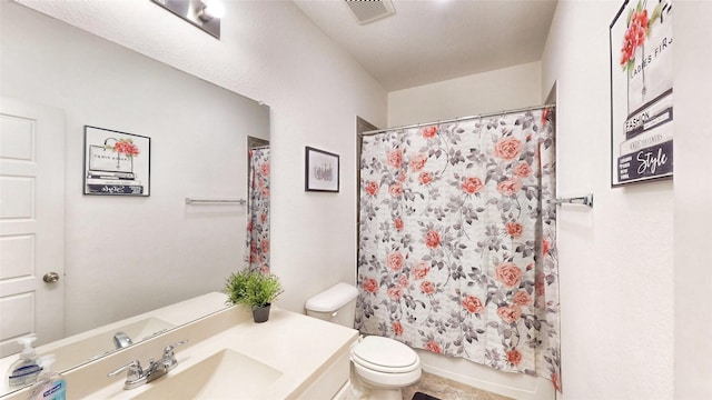 bathroom with toilet, vanity, visible vents, and shower / bathtub combination with curtain