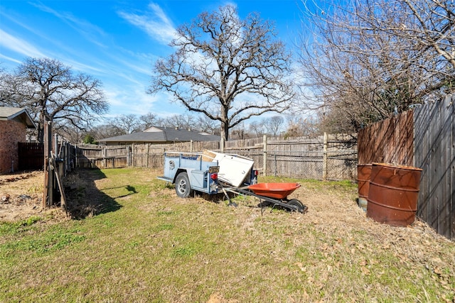 view of yard featuring a fenced backyard