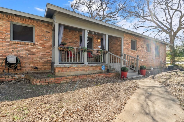 ranch-style house with brick siding