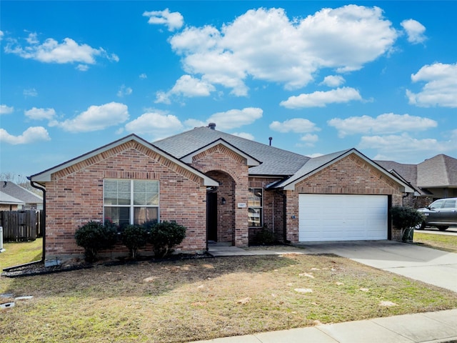 ranch-style home with an attached garage, brick siding, driveway, roof with shingles, and a front yard