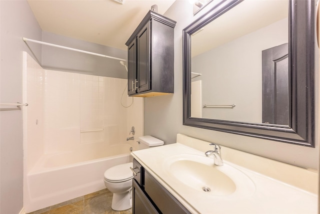 bathroom with toilet, vanity, and shower / tub combination