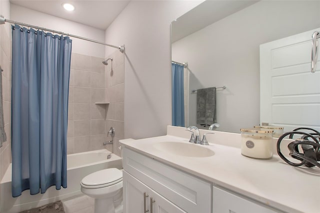 full bath featuring shower / bath combo, vanity, and toilet