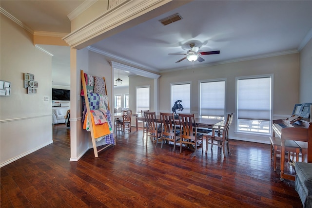 dining space featuring visible vents, dark wood finished floors, baseboards, and ceiling fan