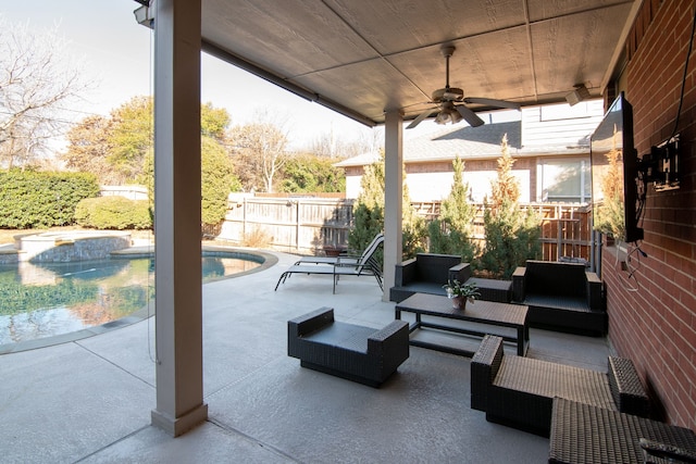 view of patio with a fenced in pool, fence, an outdoor living space, and ceiling fan