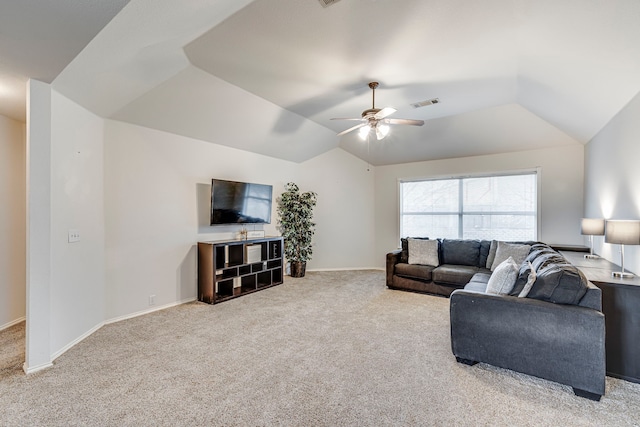 carpeted living room featuring lofted ceiling, baseboards, visible vents, and a ceiling fan