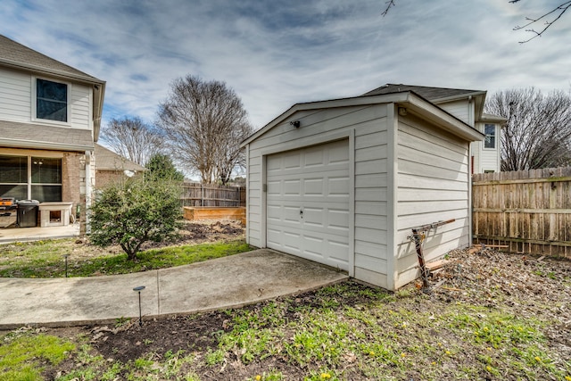 garage featuring fence