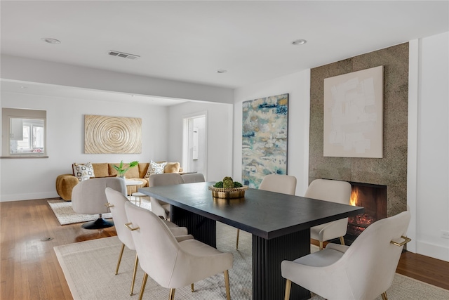 6005 Northwood Rd, Dallas, TX 75225 - dining space featuring visible vents, recessed lighting, baseboards, and wood finished floors