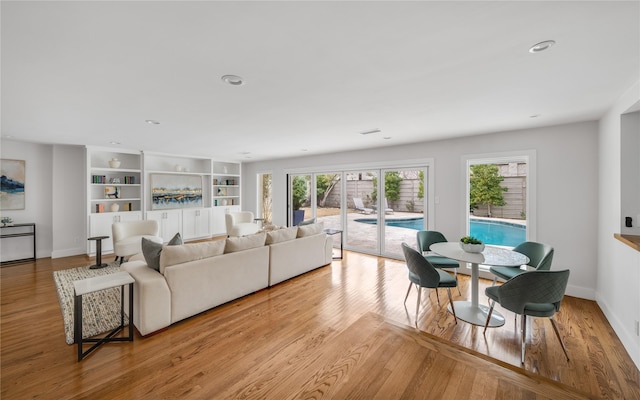6005 Northwood Rd, Dallas, TX 75225 - living area featuring recessed lighting, baseboards, and wood finished floors