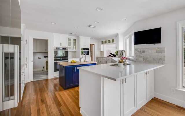 6005 Northwood Rd, Dallas, TX 75225 - dining space featuring baseboards, a wealth of natural light, and light wood-style floors