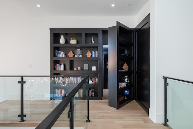 interior space featuring light wood-style flooring and recessed lighting