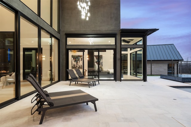 view of patio featuring fence