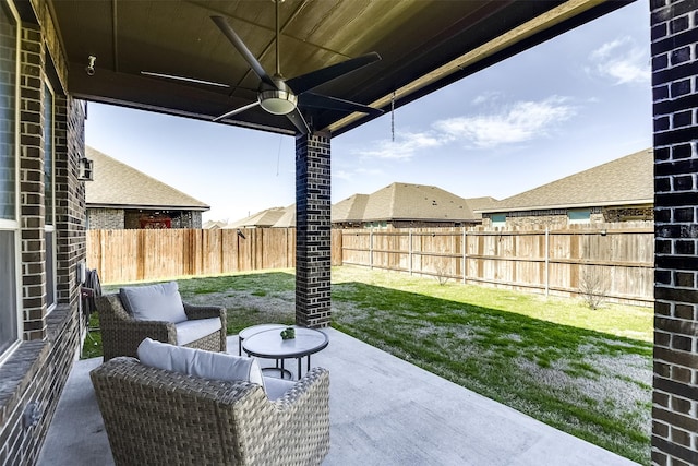 view of patio / terrace featuring ceiling fan and a fenced backyard