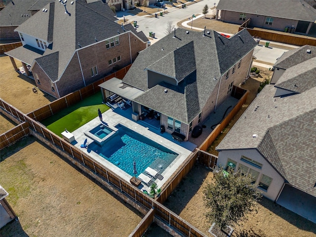 drone / aerial view with a residential view