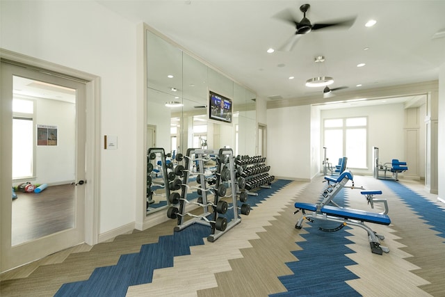 gym with a ceiling fan, recessed lighting, light colored carpet, and baseboards