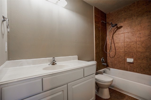 full bathroom with toilet, shower / bathing tub combination, tile patterned flooring, and vanity