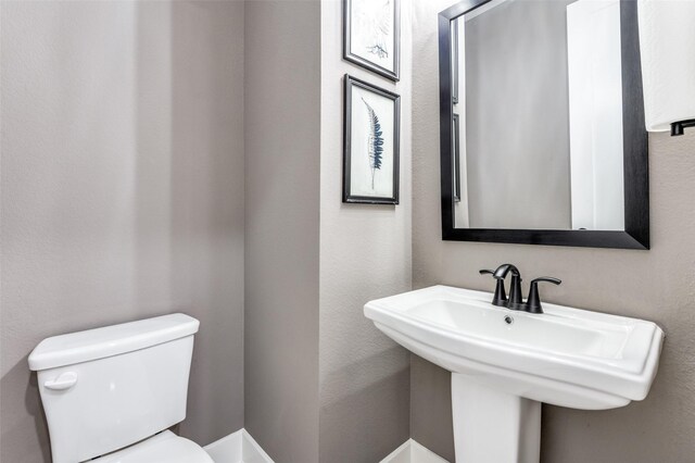 2521 Warwick Dr, Celina, TX 75009 - bathroom with toilet and a sink