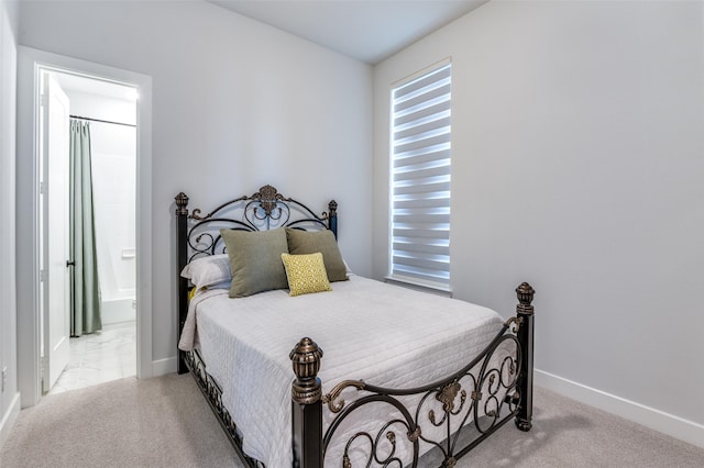 2521 Warwick Dr, Celina, TX 75009 - carpeted bedroom featuring baseboards and ensuite bathroom