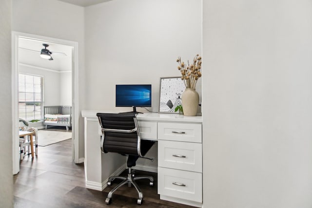 home office featuring baseboards and dark wood-style flooring