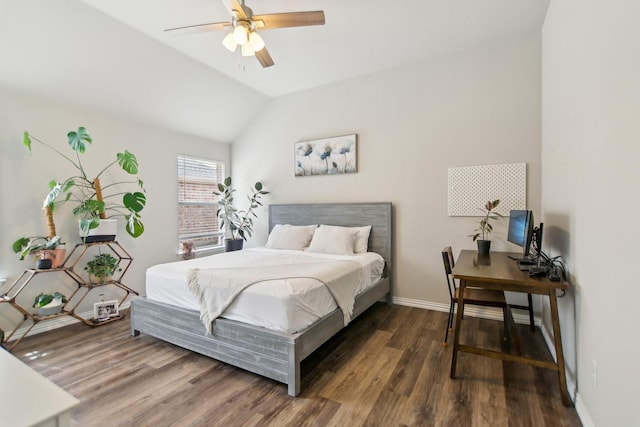 bedroom featuring a ceiling fan, vaulted ceiling, dark wood finished floors, and baseboards