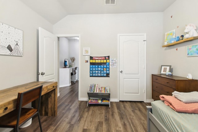 bedroom featuring vaulted ceiling, wood finished floors, visible vents, and baseboards