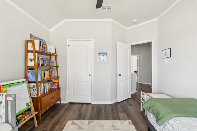 bedroom featuring a ceiling fan, baseboards, vaulted ceiling, and wood finished floors