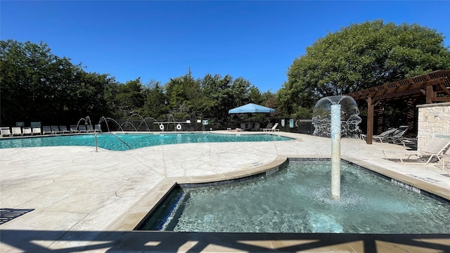 pool with fence, a pergola, and a patio