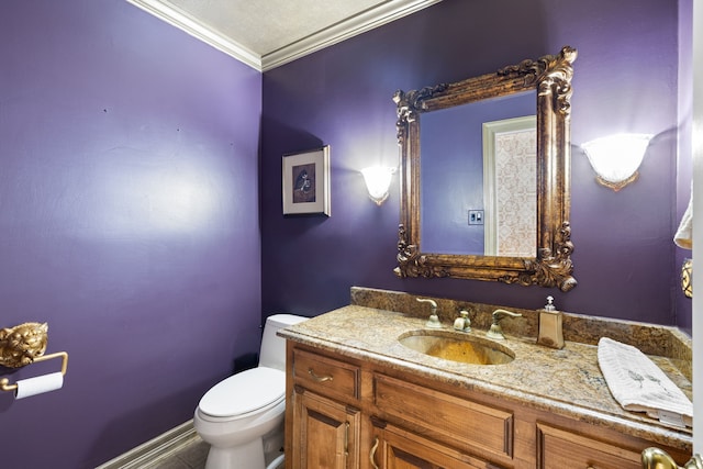 half bathroom with toilet, vanity, and crown molding