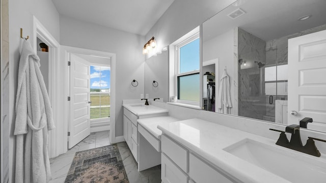 full bath featuring marble finish floor, a stall shower, vanity, and visible vents