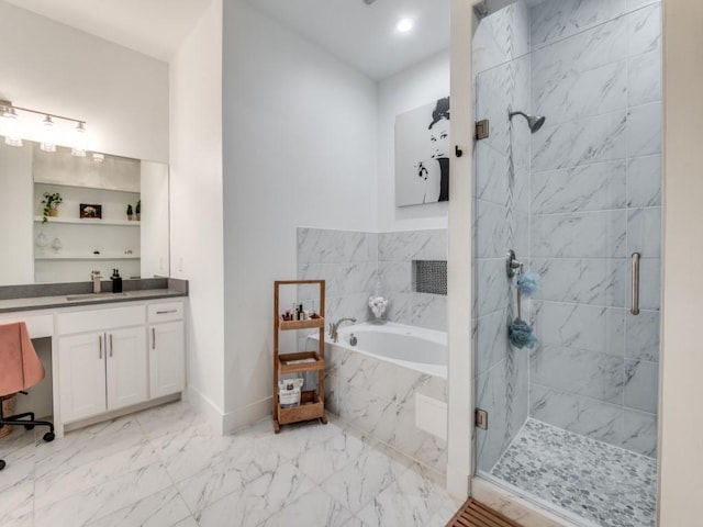 bathroom with marble finish floor, a shower stall, vanity, baseboards, and a bath