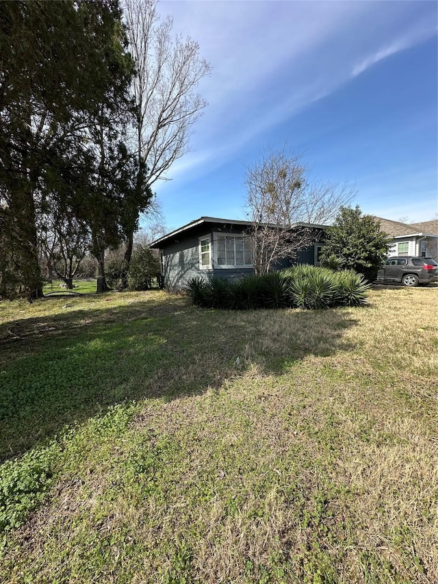 exterior space with a lawn