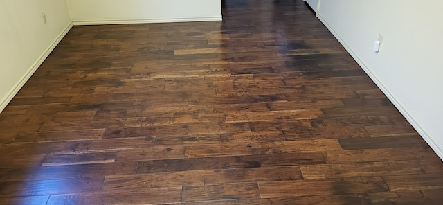 interior details with wood finished floors and baseboards