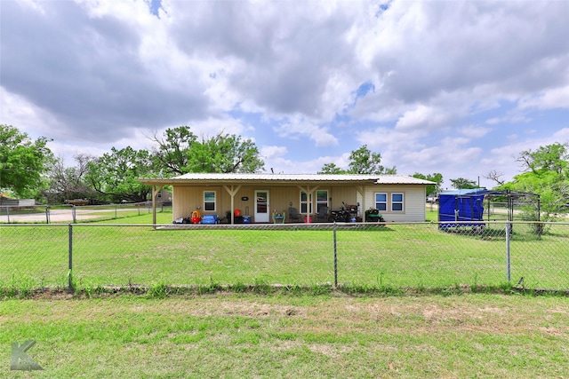 back of property featuring a yard and a fenced backyard