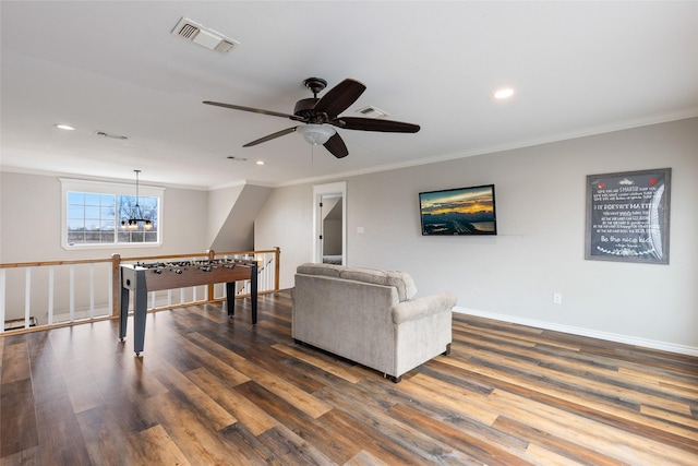 3147 US Highway 67, Sulphur Springs, TX 75482 - living area featuring ornamental molding, a ceiling fan, dark wood-type flooring, recessed lighting, and baseboards