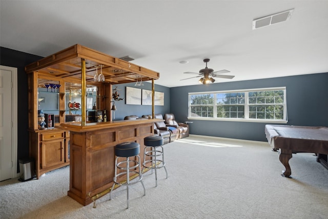 bar featuring a ceiling fan, visible vents, pool table, a dry bar, and light carpet