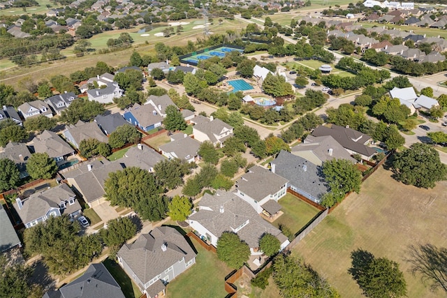 birds eye view of property with a residential view