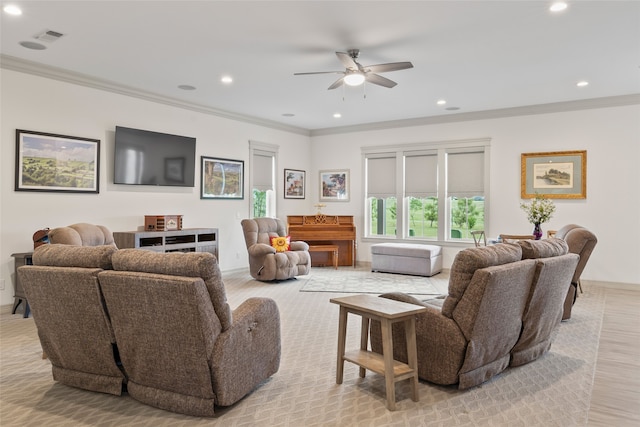 living room featuring ceiling fan, ornamental molding, and recessed lighting