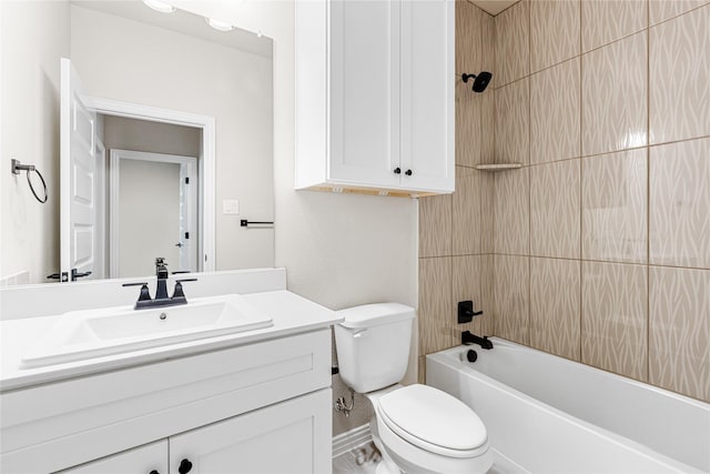 bathroom featuring shower / tub combination, vanity, and toilet