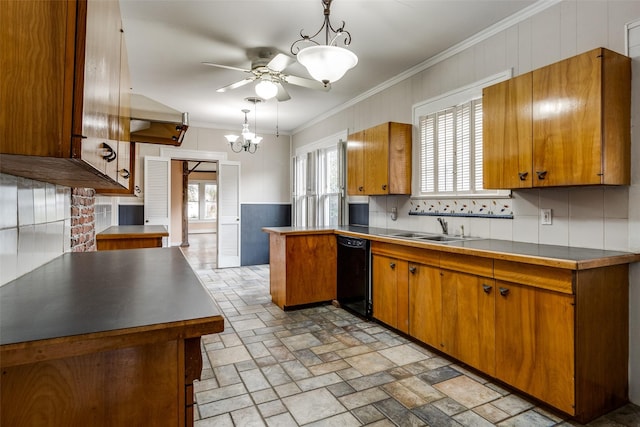 kitchen with pendant lighting, black dishwasher, brown cabinetry, and a sink