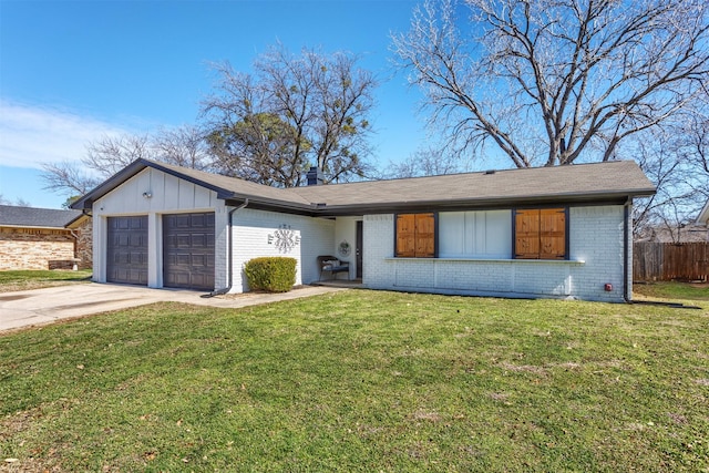 view of front of home featuring brick siding, concrete driveway, an attached garage, fence, and a front lawn