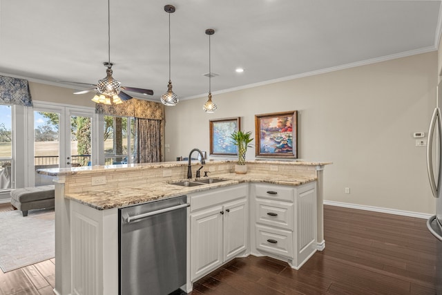 kitchen with a sink, a kitchen island with sink, white cabinets, and stainless steel dishwasher