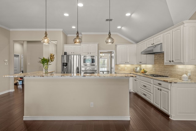 kitchen featuring a center island, decorative light fixtures, appliances with stainless steel finishes, white cabinetry, and under cabinet range hood