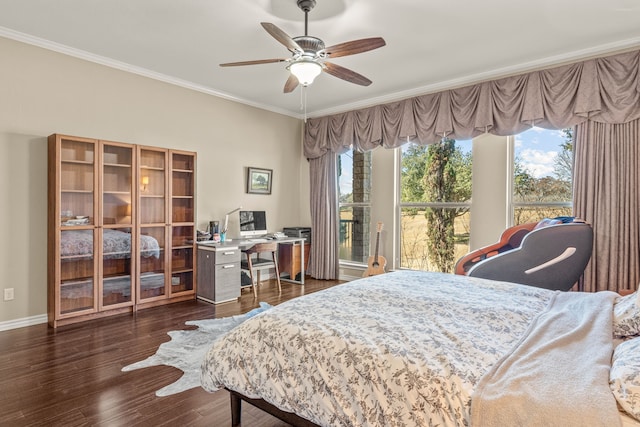 bedroom featuring dark wood-style floors, baseboards, ornamental molding, and ceiling fan