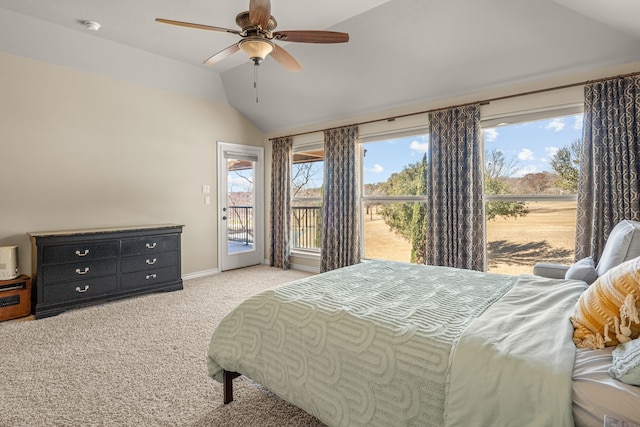 bedroom with lofted ceiling, ceiling fan, light carpet, baseboards, and access to exterior