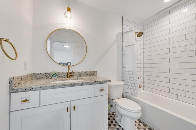 full bath featuring vanity, toilet, and shower / bath combo with shower curtain