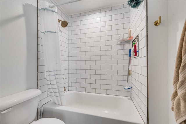 bathroom with shower / bath combo with shower curtain and toilet