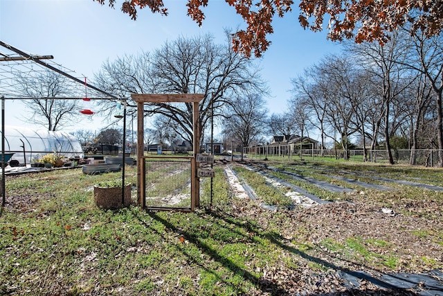 view of yard featuring a gate and fence