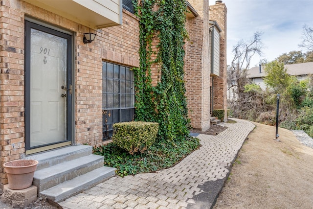 11655 Audelia Rd Unit 901, Dallas, TX 75243 - view of exterior entry featuring brick siding