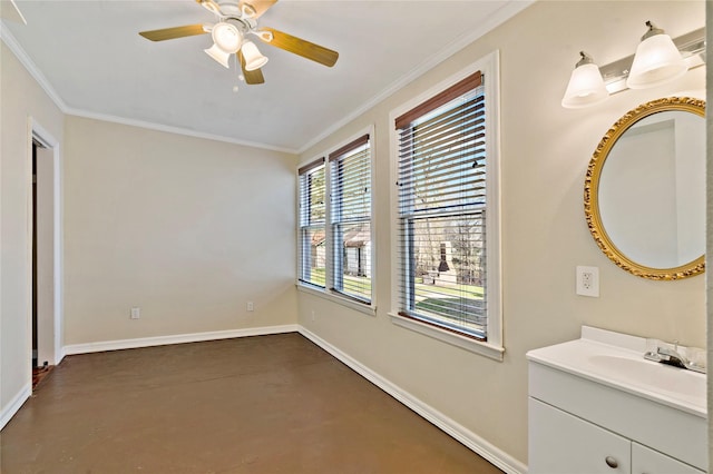 interior space with ornamental molding, a sink, and baseboards