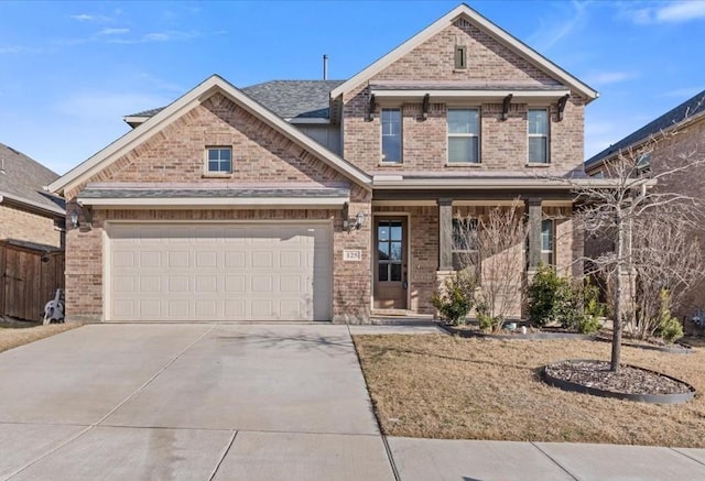 craftsman inspired home featuring a garage, concrete driveway, brick siding, and roof with shingles